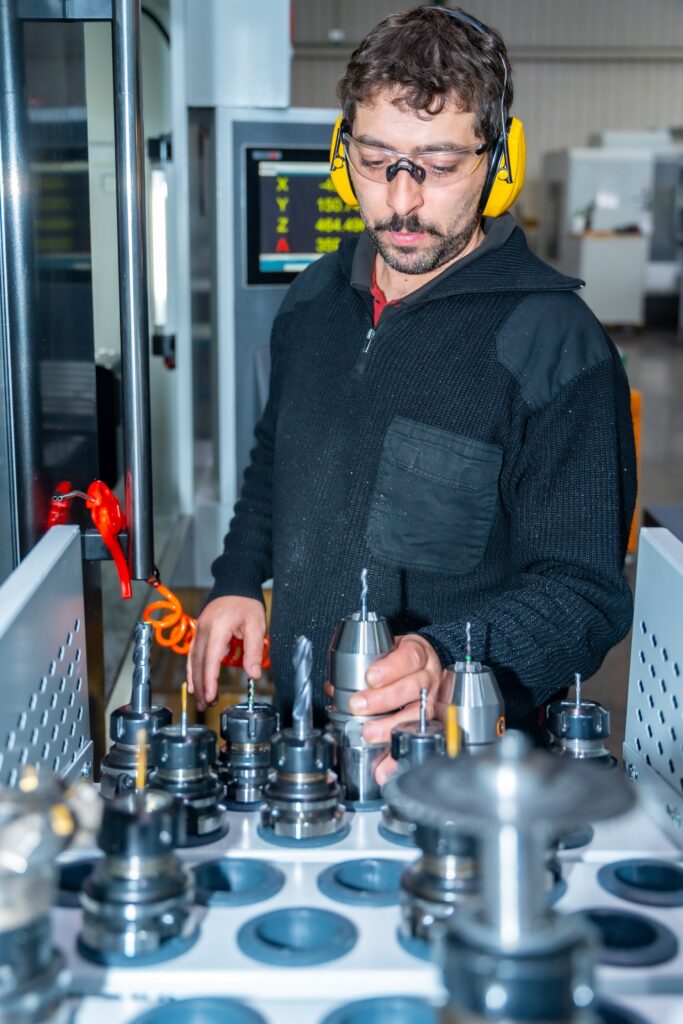 Technician handling parts